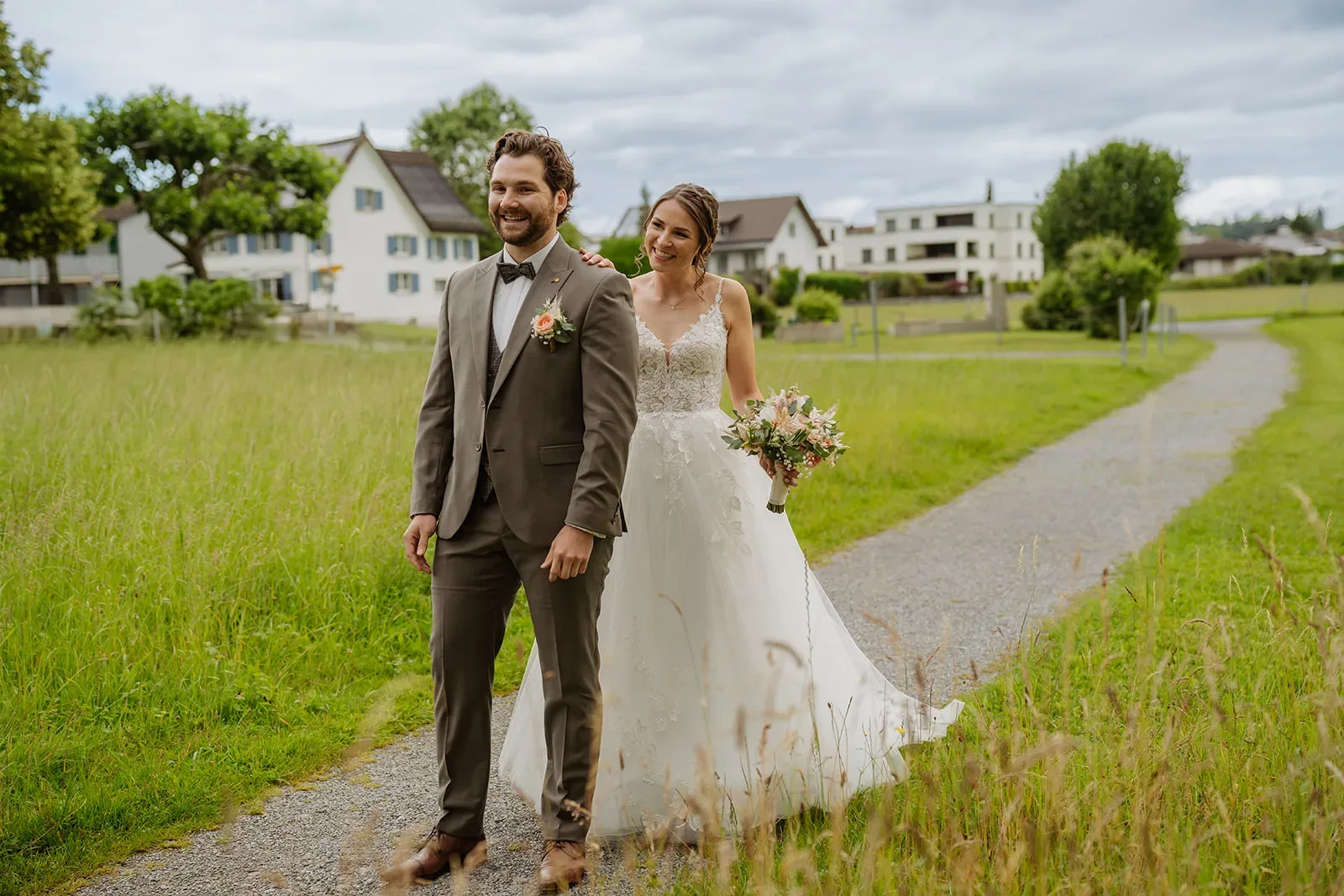 First look outside Busskirch church on the upper Lake Zurich before a wedding at Bächlihof